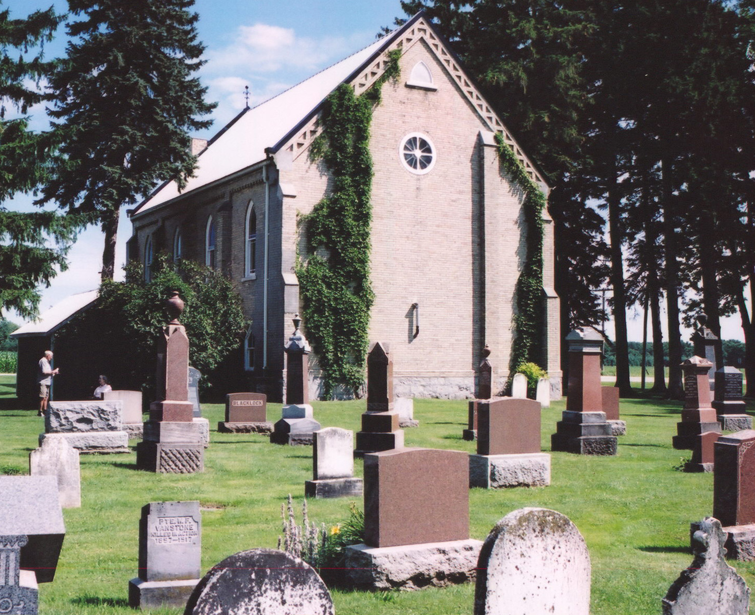Avonbank Presbyterian Church, rear view, Alfred Longhurst and his aunt Margaret Faith Cooper (nee Longhurst) in the distance.